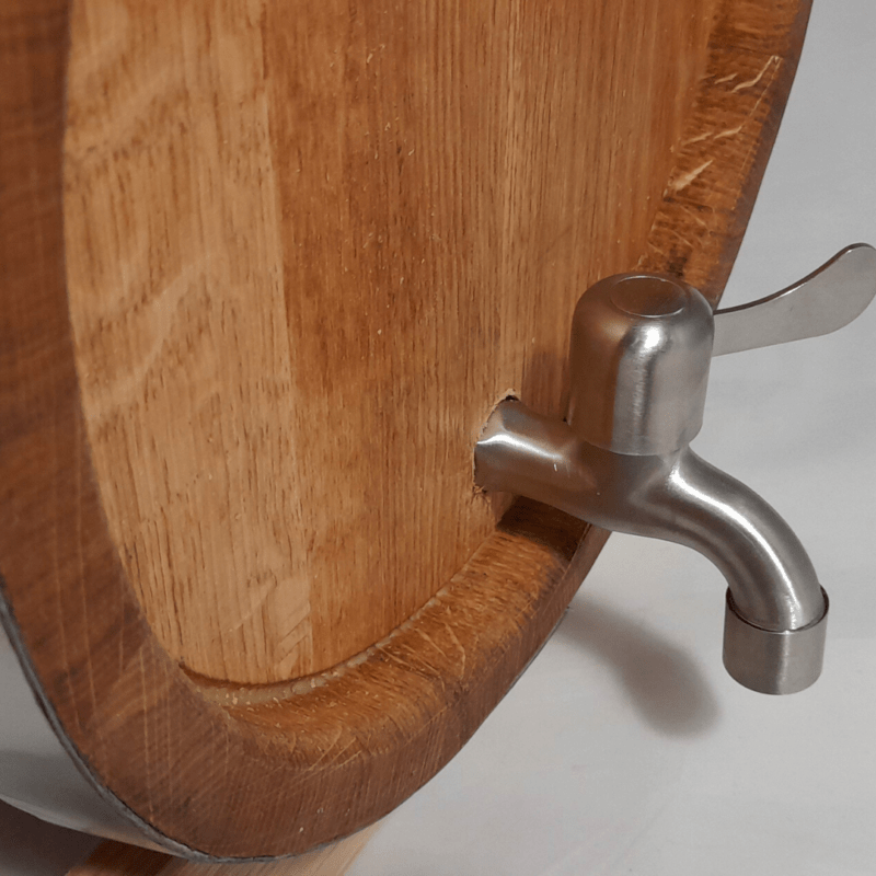 Barrel with stopper and metal tap